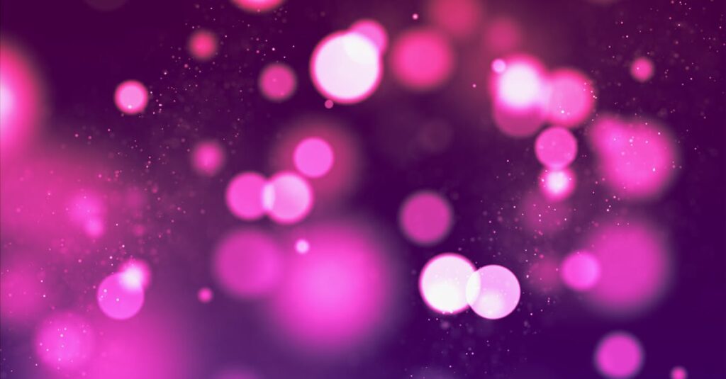 A mesmerizing pink bokeh light background perfect for creative designs and themes.